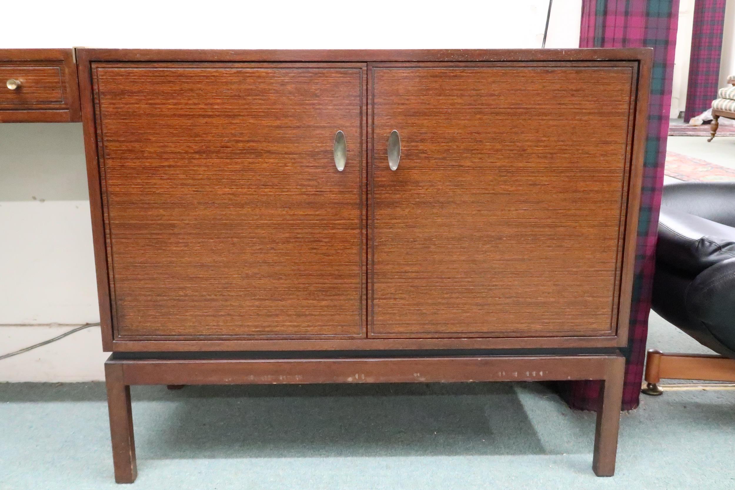 A mid 20th century stained teak Greaves and Thomas pair of two door cabinets joined by single - Image 2 of 7