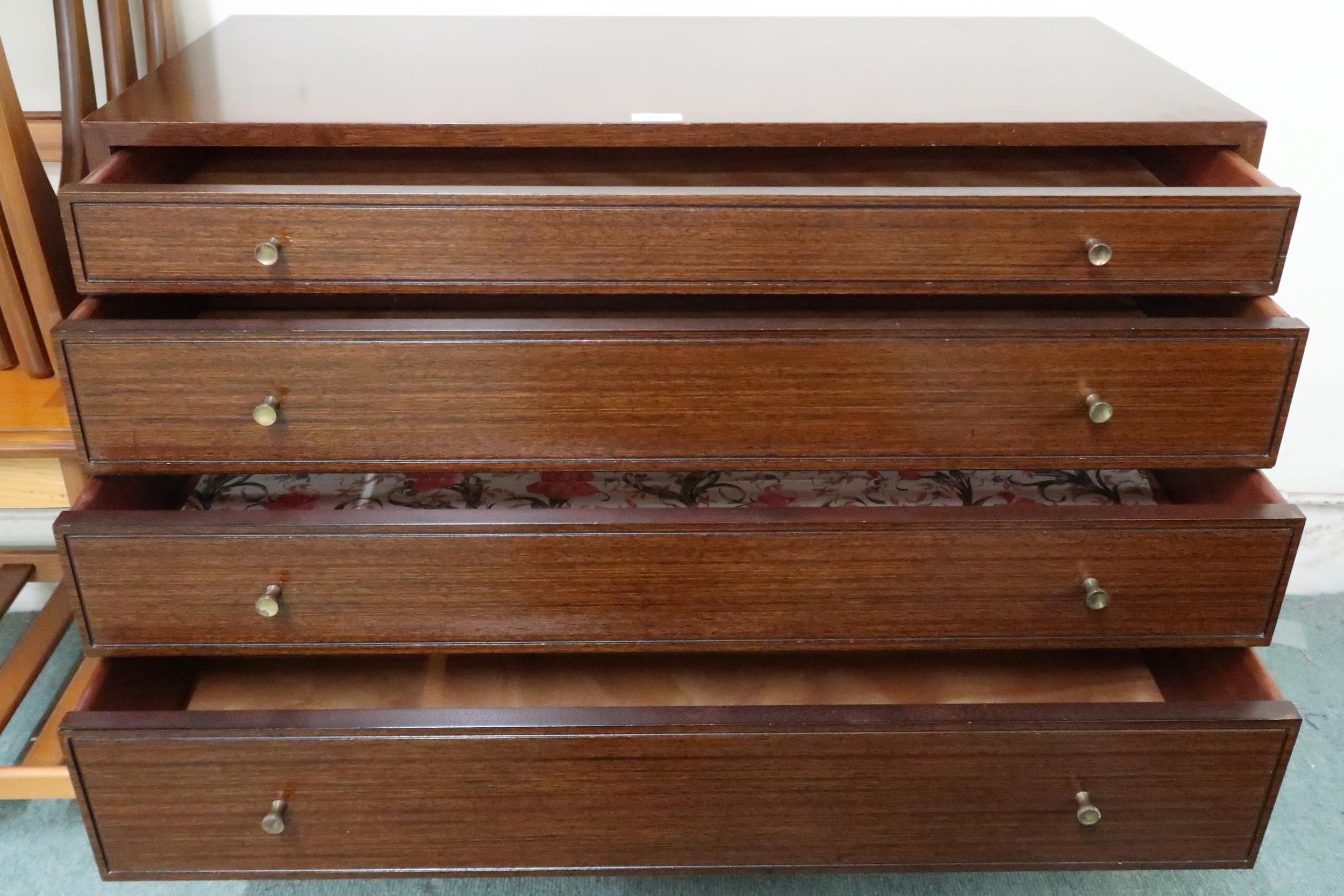 A mid 20th century stained teak Greaves and Thomas graduating chest of four drawers on square - Image 3 of 4