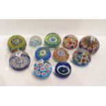 Eleven millefiori glass paperweights Condition Report:No condition report available.