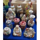 A pair of Chinese lidded jars,  smiling buddha figures and other items Condition Report:No condition