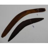 An Aboriginal Australian carved hardwood boomerang, measuring approx. 65.5cm in length, together