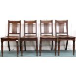 A lot of four Victorian oak dining chairs with shaped seats on turned front supports, 92cm high (