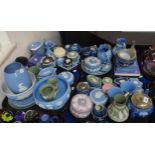 A large collection of Wedgwood jasperware in assorted colours including trinket boxes, dishes,