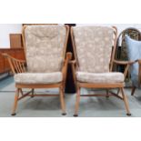 A lot of two mid 20th century Ercol elm and beech framed open armchairs, 107cm high x 75cm wide x