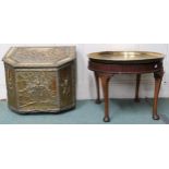 A lot comprising brass embossed coat bunker and a Moorish style brass topped circular occasional