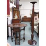 A 20th century mahogany torchiere stand with circular top on reeded column on stepped base, 153cm