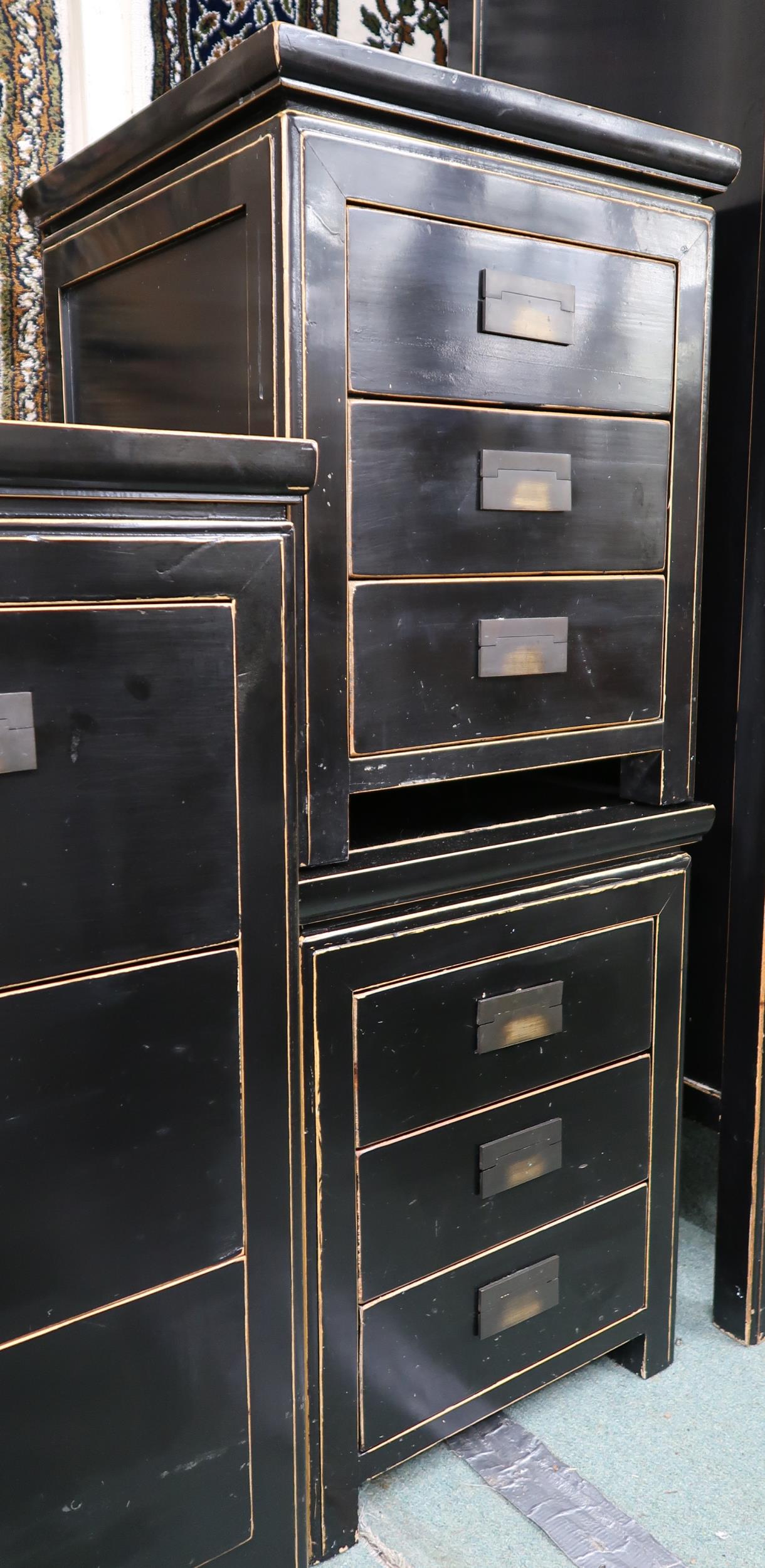 A pair of 20th century black lacquer three drawer bedside chests with brass hinged drawer pulls, - Image 2 of 4