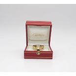 A Cartier 18ct three colour gold 'Trinity Ring' the red gold band stamped 'Les Must De Cartier'