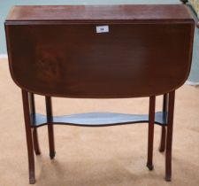 A Victorian mahogany and satinwood inlaid drop end Sutherland table with pierced ends joined by