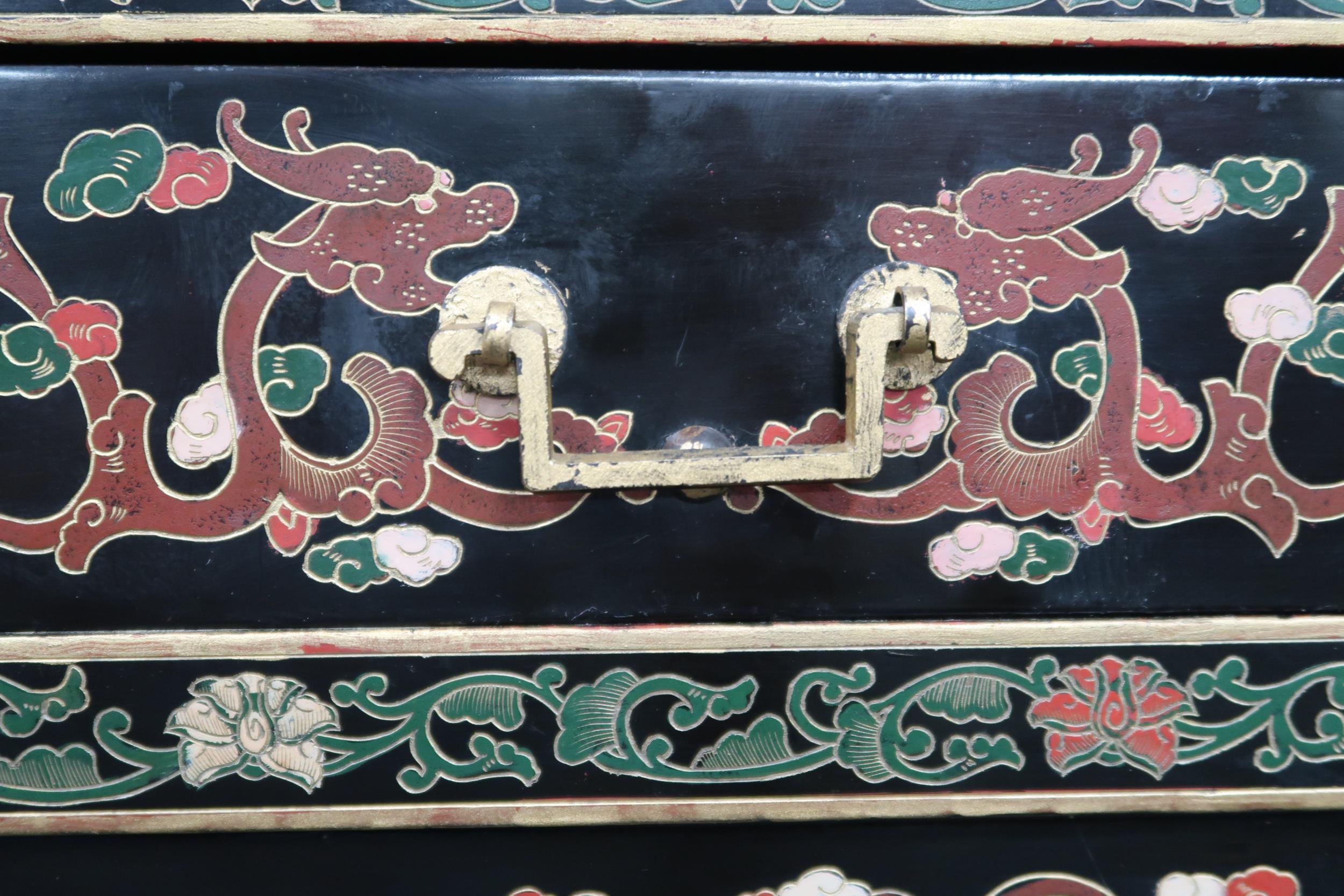 A 20th century black lacquer Chinese altar table with scroll end top over pair of drawers on - Image 5 of 8