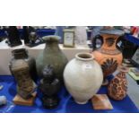 Three antique style pottery vases including a Chinese Tang style example, two metal vases, a tile