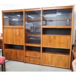 A 20th century stained teak media unit, 198cm high x 255cm wide x 53cm deep Condition Report: