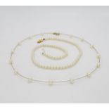 A 9ct gold ladies Rotary watch, a 9ct gold wire chain pearl necklace, and a string of pearls with