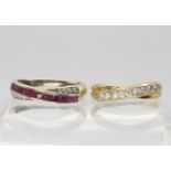 A 9ct gold crossover ring set with cz, size O1/2, together with a red gem and diamond accent