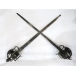 Two Scottish basket-hilted broadswords, of recent manufacture, one with blade measuring approx. 72.