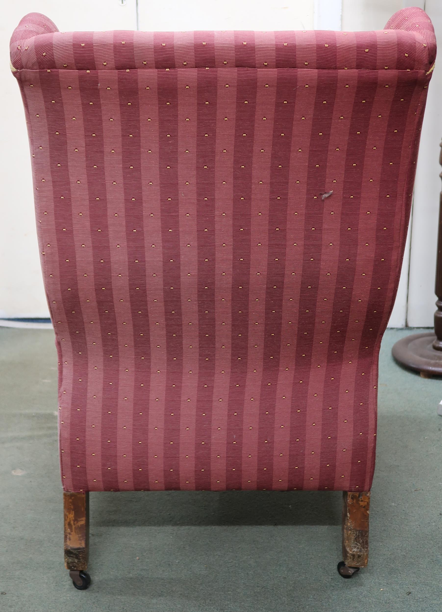 A Victorian wing back armchair with red striped upholstery on turned front supports, 110cm high x - Image 6 of 6