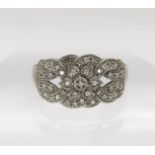 A 9ct white gold diamond accent cluster ring with milgrain setting, finger size T1/2, weight 4.