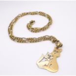 An 18ct gold Italian made Mr & Mrs Pussycat pendant, on a 18ct yellow and white gold figaro chain.