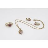 A 9ct gold ruby and diamond pendant on chain and matching earrings together with a similar ring