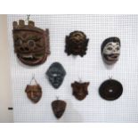 A collection of assorted tribal masks, others and a figural tray (11) Condition Report:No