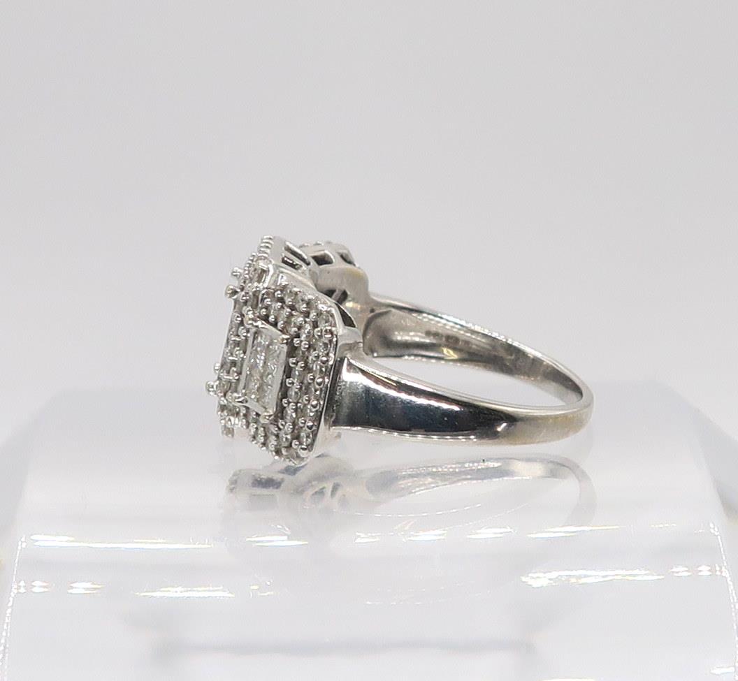 An 18ct white gold diamond cluster ring, set with estimated approx of 1ct of brilliant and - Image 2 of 4