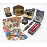 A collectors lot comprising Faklands War shell art, vintage casino chips, beer mats, a 1996 NHL