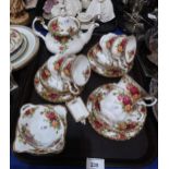 A Royal Albert Old Country Roses teaset comprising teapot, six cups, saucers and plates and small