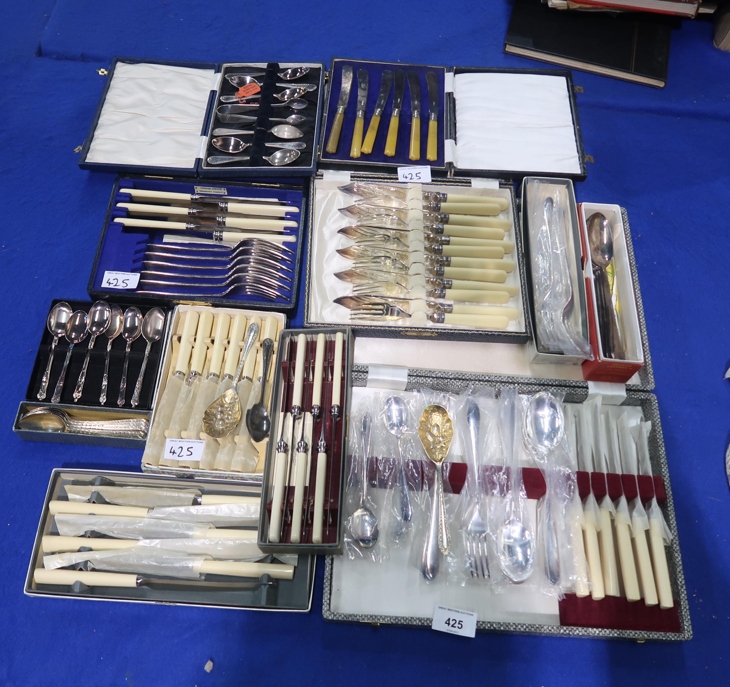 A collection of cased EPNS cutlery including fish knives and forks, fruit knives, tea spoons etc