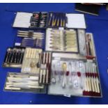 A collection of cased EPNS cutlery including fish knives and forks, fruit knives, tea spoons etc
