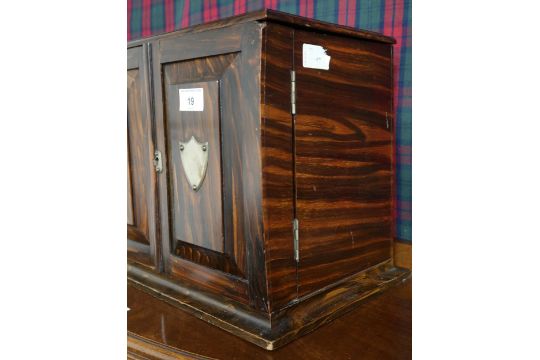 A Victorian rosewood smokers cabinet with hinged top over pair of doors concealing fitted - Image 2 of 6