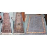 A lot comprising three assorted machine made rugs (3) Condition Report:Available upon request