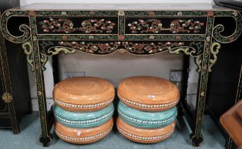 A 20th century black lacquer Chinese altar table with scroll end top over pair of drawers on