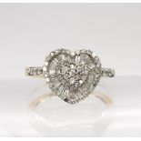 A 9ct gold heart shaped diamond cluster ring, set with estimated approx 0.50cts of brilliant and