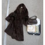 A crocodile skin handbag, a bell pull, a fur coat, gloves etc Condition Report:No condition report