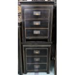 A pair of 20th century black lacquer three drawer bedside chests with brass hinged drawer pulls,