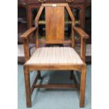 An early 20th century oak arts and crafts style armchair, 92cm high  Condition Report:Available upon