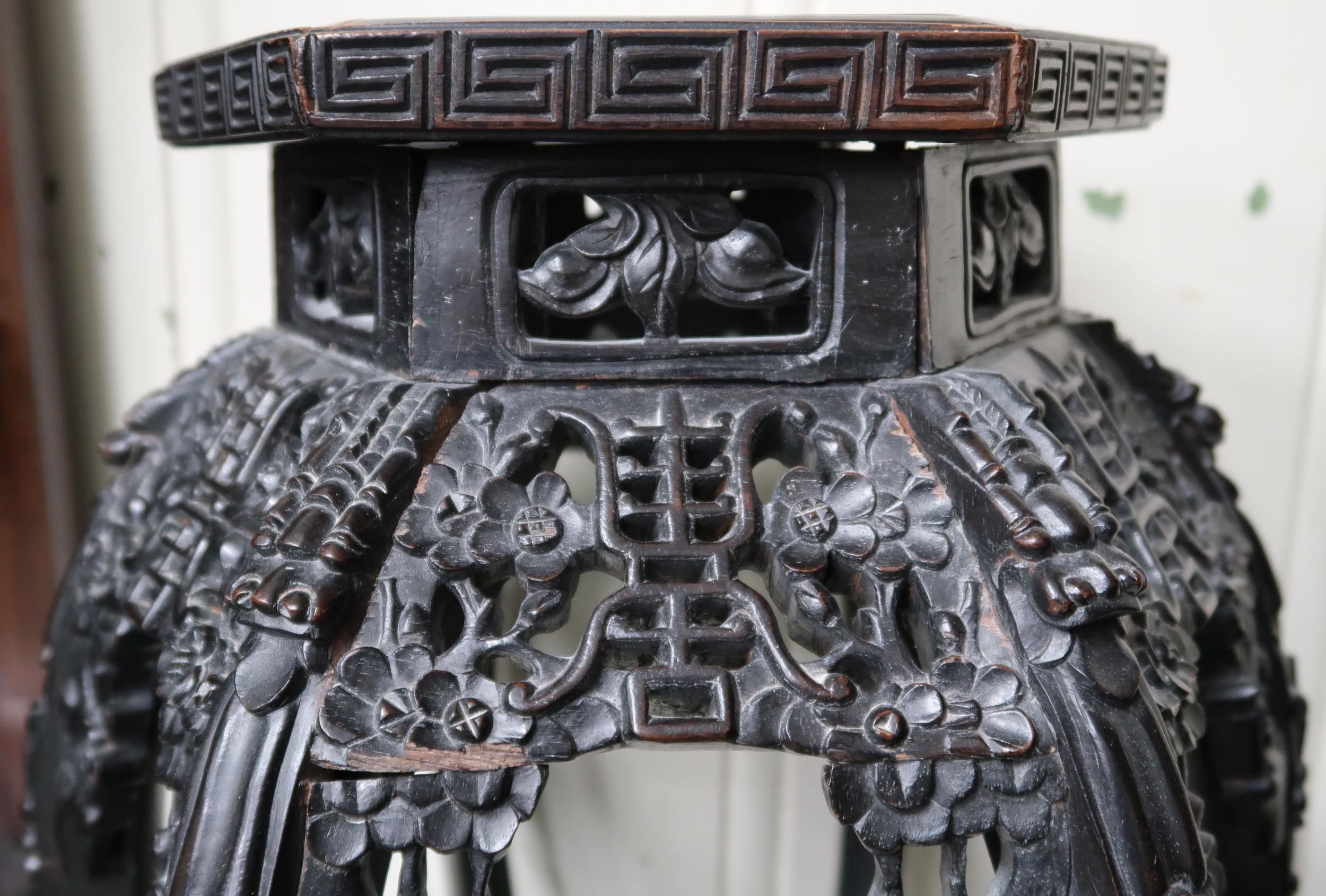 A 19th century Chinese jardinière stand with hexagonal marble inset top over carved pierced - Image 3 of 6