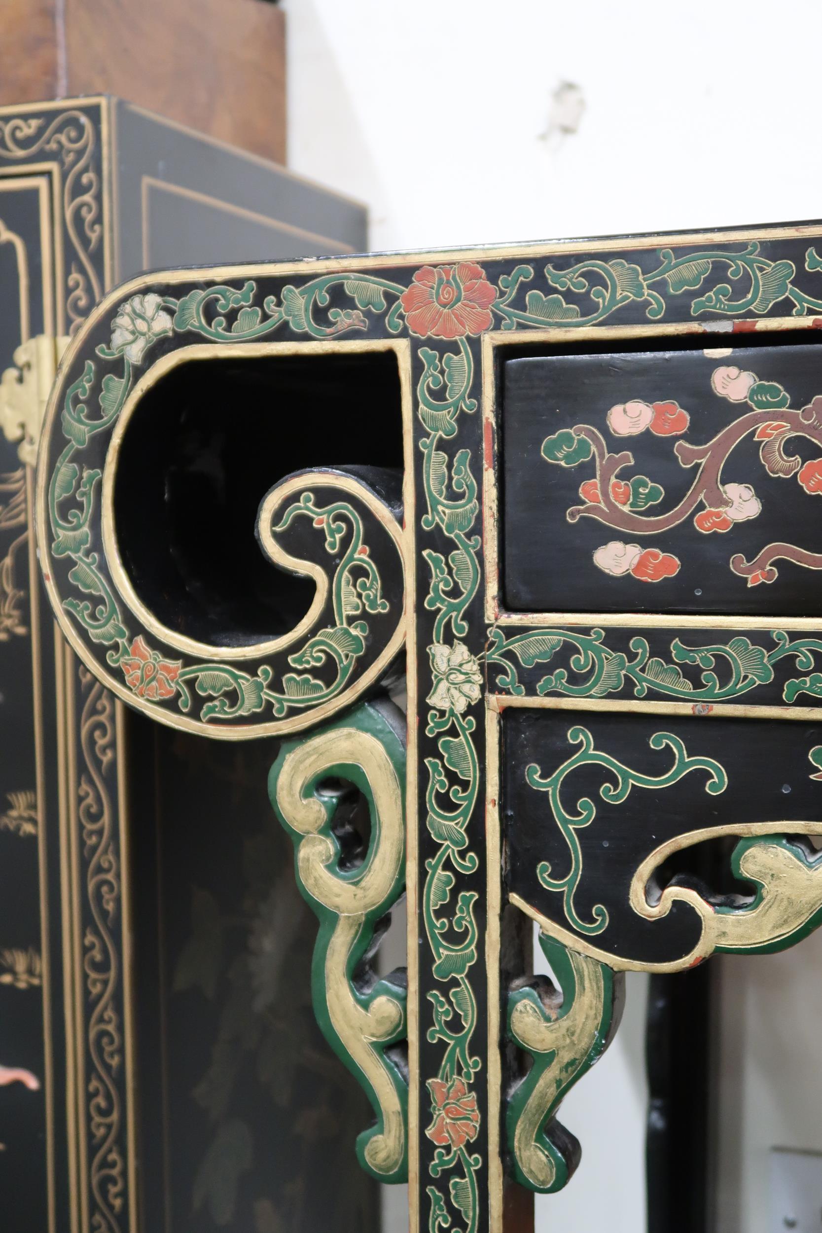 A 20th century black lacquer Chinese altar table with scroll end top over pair of drawers on - Image 8 of 8