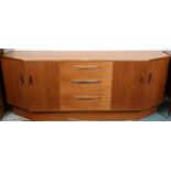 A mid 20th century teak G Plan "Hex" sideboard with three central drawers flanked by pairs of