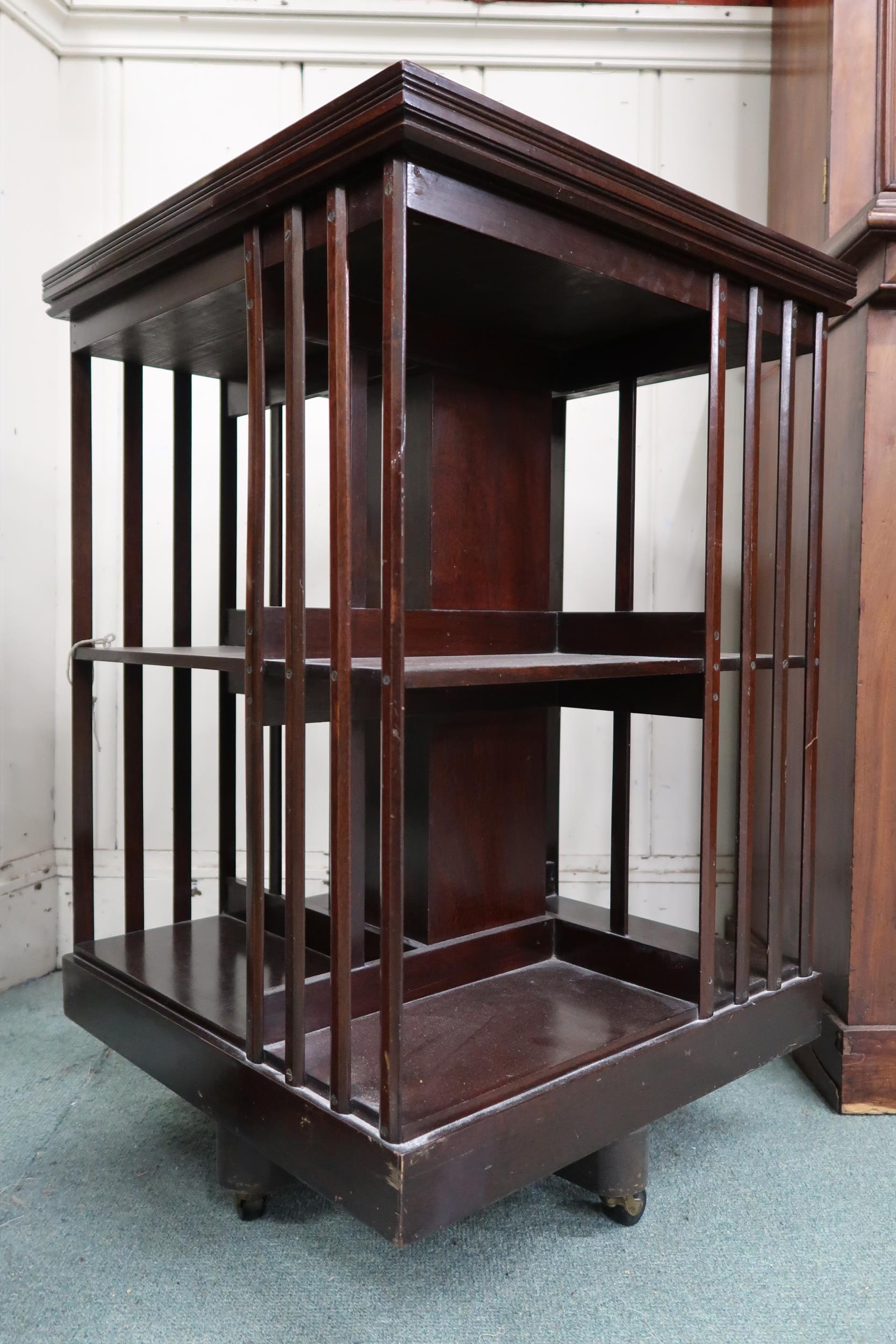 An early 20th century mahogany revolving bookcase with two tiers of bookshelves, 82cm high x 53cm - Image 4 of 6