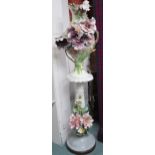 A 20th century ceramic floral pattern jardiniere on stand, 163cm high Condition Report:Available
