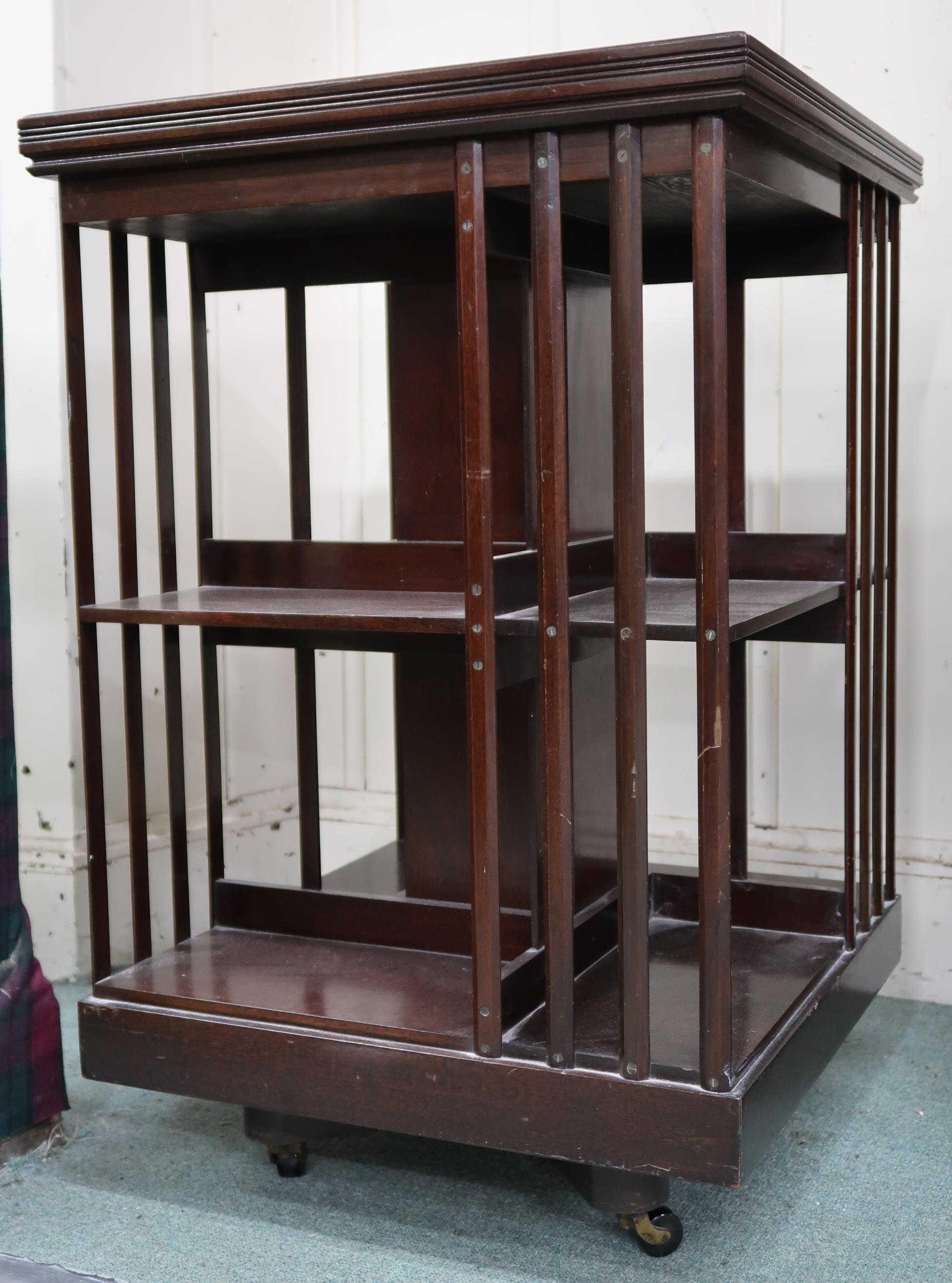An early 20th century mahogany revolving bookcase with two tiers of bookshelves, 82cm high x 53cm - Image 3 of 6