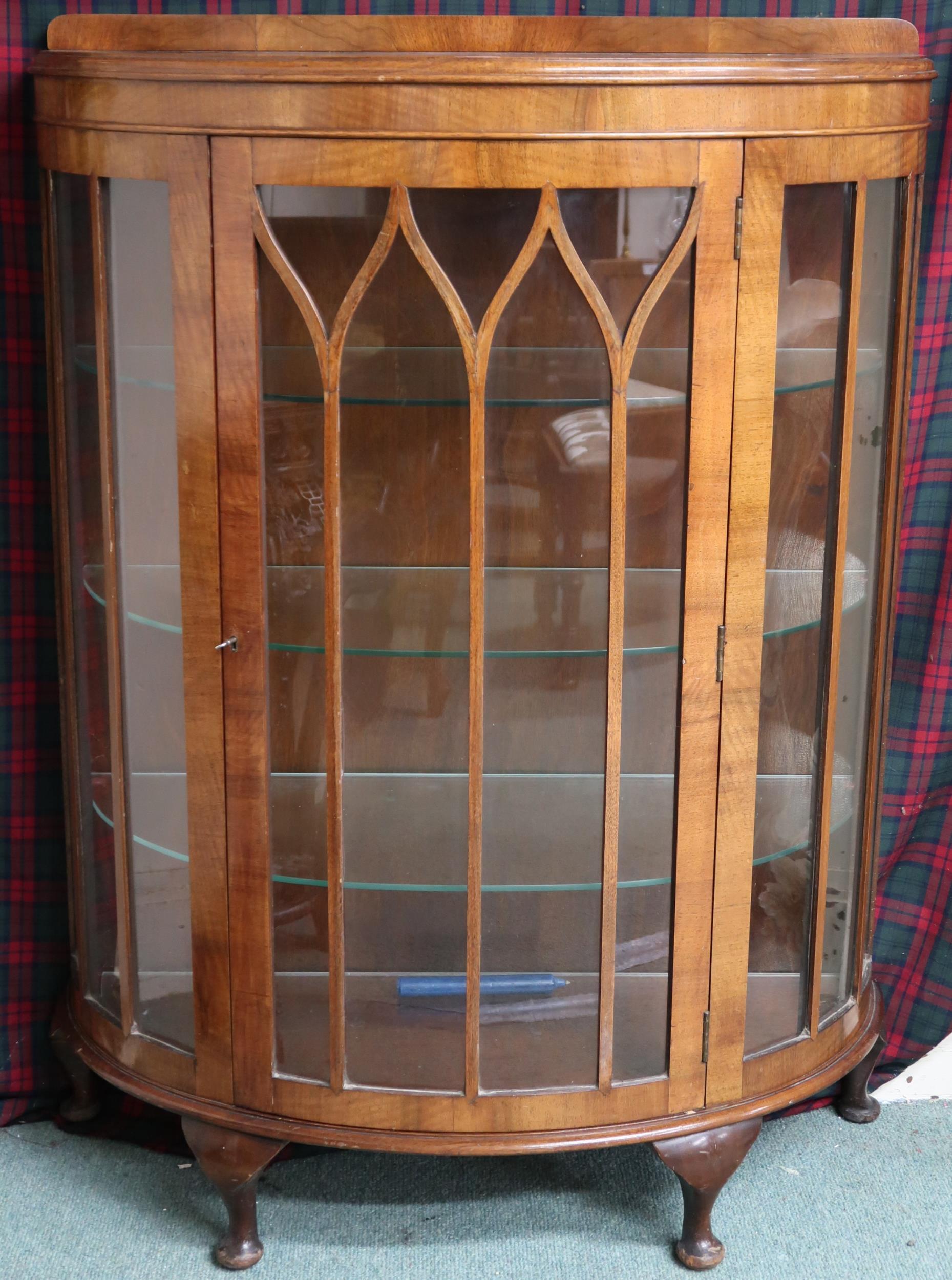 An early 20th century mahogany demilune glazed single door display cabinet, 120cm high x 89cm wide x