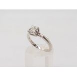 An 18ct white gold princess cut diamond ring the diamond is estimated approx at 0.70ctsin classic