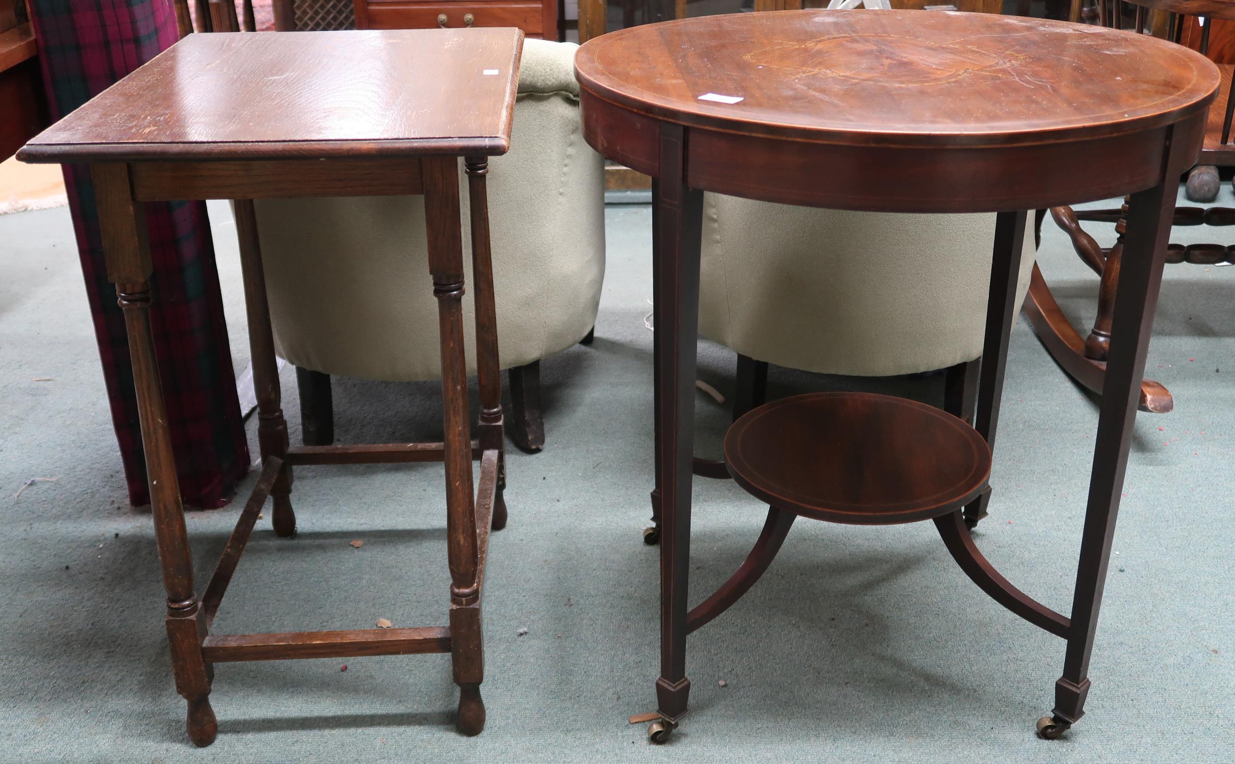 A Victorian mahogany and satinwood inlaid circular topped two tier window table and an oak