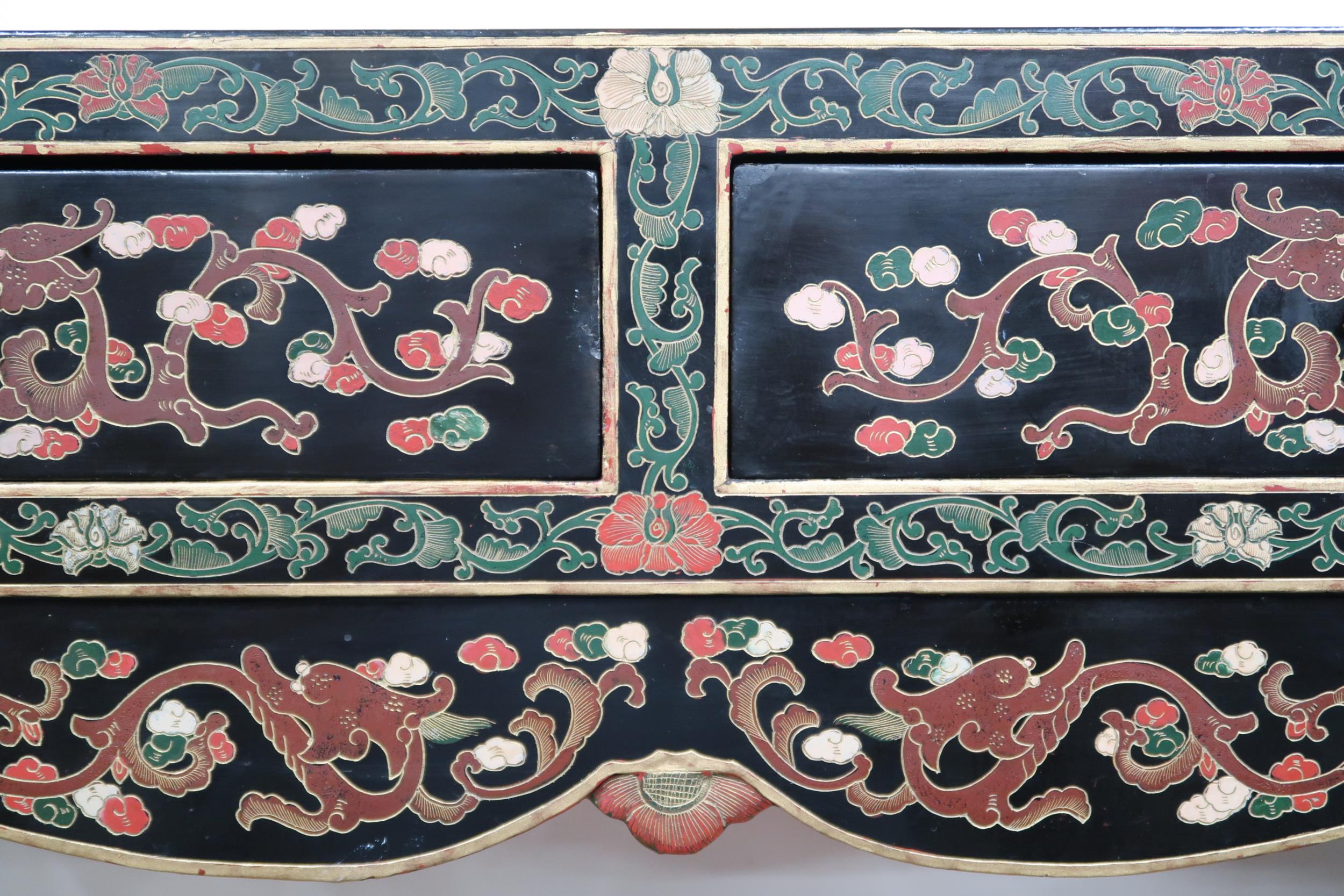 A 20th century black lacquer Chinese altar table with scroll end top over pair of drawers on - Image 4 of 8