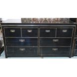 A 20th century black lacquer bank of drawers with four short over two pairs of long drawers with