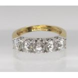 A 14k gold cz five stone ring, size O1/2, weight 4.8gms Condition Report:Available upon request