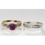 A 9ct gold ruby and diamond accent ring, size P, together with a 9ct white gold cz ring size P1/2,