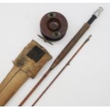 A Hardy cane fishing rod together with a wooden and brass fitted reel Condition Report:Available